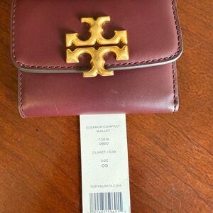 Tory Burch Burgundy Wallet with Gold Emblem